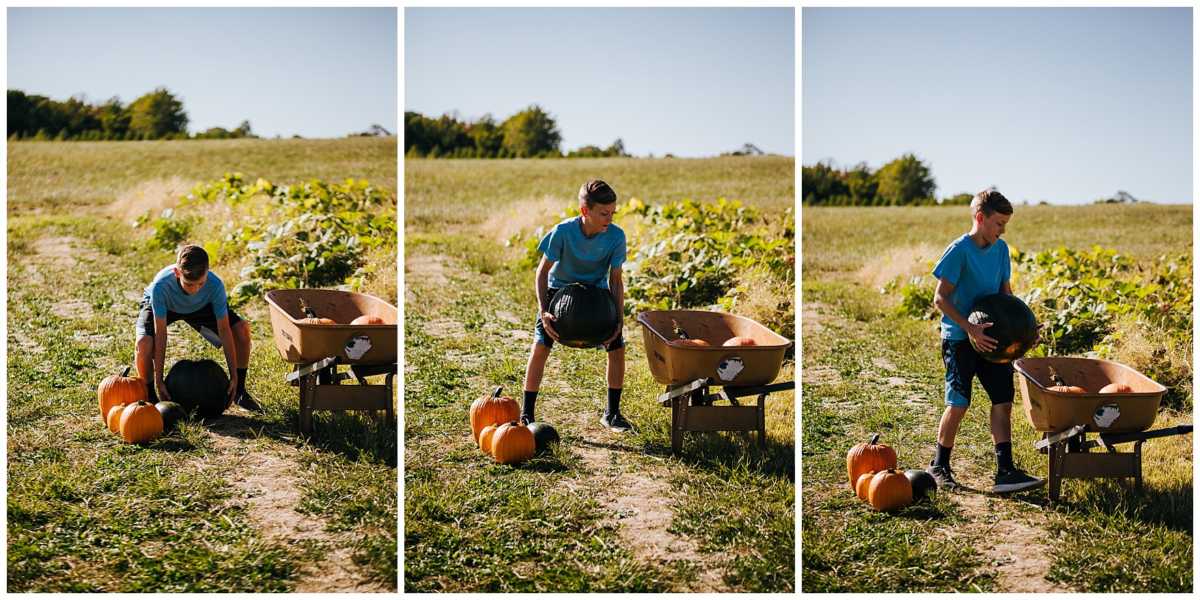 kid in pumpkin patch